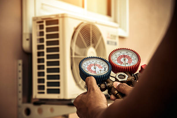 Professional Air Conditioning Service technician working in Burson, CA